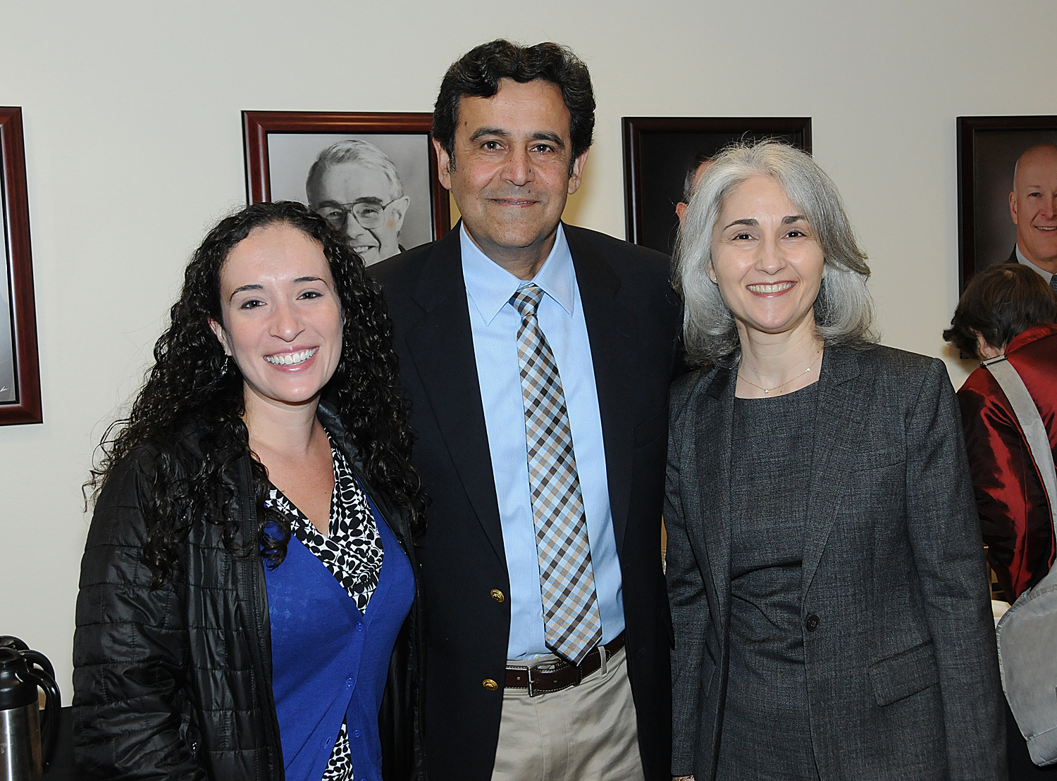 Asha Jetmalani, Ajit Jetmalani, and Deborah Cabannis pose for a picture