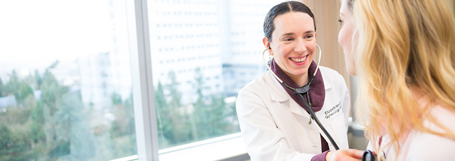 Elizabeth Munro, M.D. with a patient