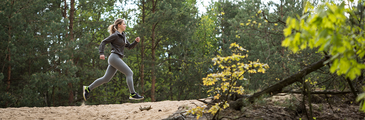 Lone runner on trail