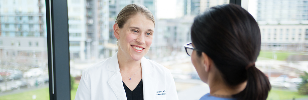 Total joint surgeon Dr. Schabel with patient
