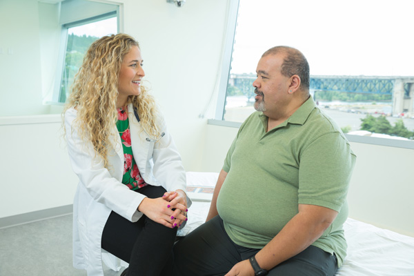 Nurse practitioner Jill Welshans meets with patients to do a complete medical exam.