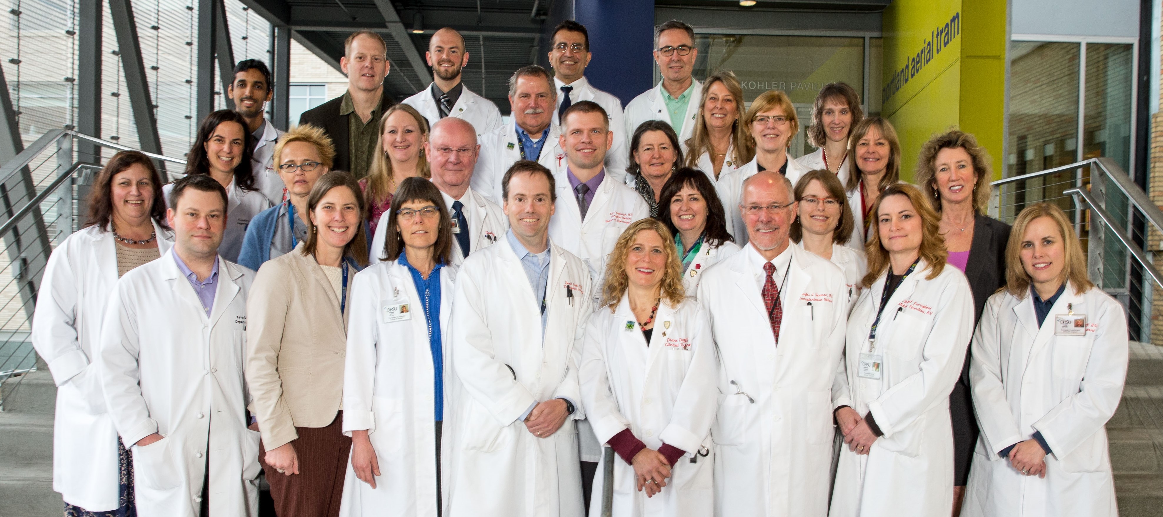 The Clinical Transplant Services Team standing together a the 博彩网站 enterence
