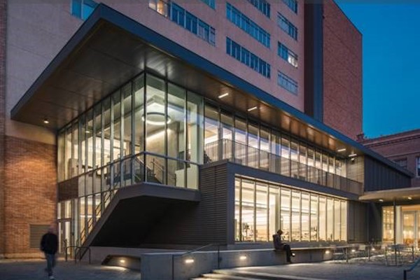 Brick and glass building at night. Brick and glass building at night.