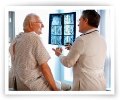 Patient and Doctor discussing scan results.