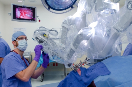 Dr. Gross performing the first TORS surgery