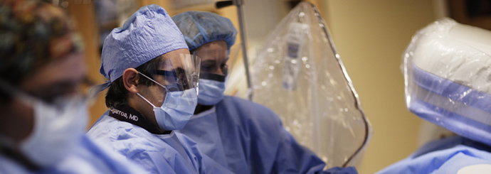 Healthcare providers in scrubs working in a clinic