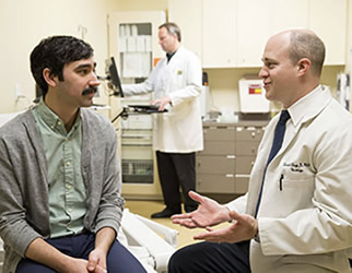 Dr. Dugi and patient