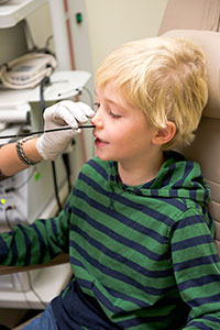 Child getting scoped through the nose
