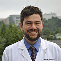 Sajadi in white coat