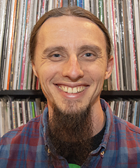 Michael Muniak with his record collection