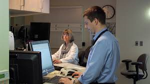 Dr. Mitin at a computer