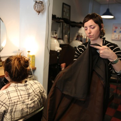 A hairdresser in a hair appointment