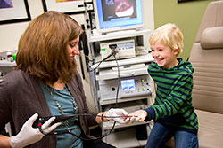 Child getting comfortable with scope