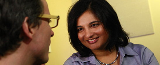 A cosmetic surgery candidate discussing their options with a doctor