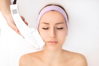 A patient receiving a laser skin rejuvenation treatment