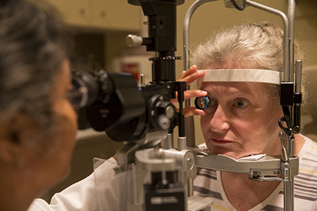 A woman having an eye exam