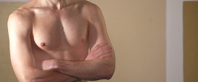 Male breast reduction surgery (gynecomastia) combines excision and liposuction to remove the excess breast tissue, resulting in a more masculine-appearing chest.