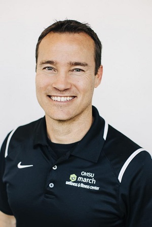 Jason Yoder of march wellness in blue Nike polo shirt.
