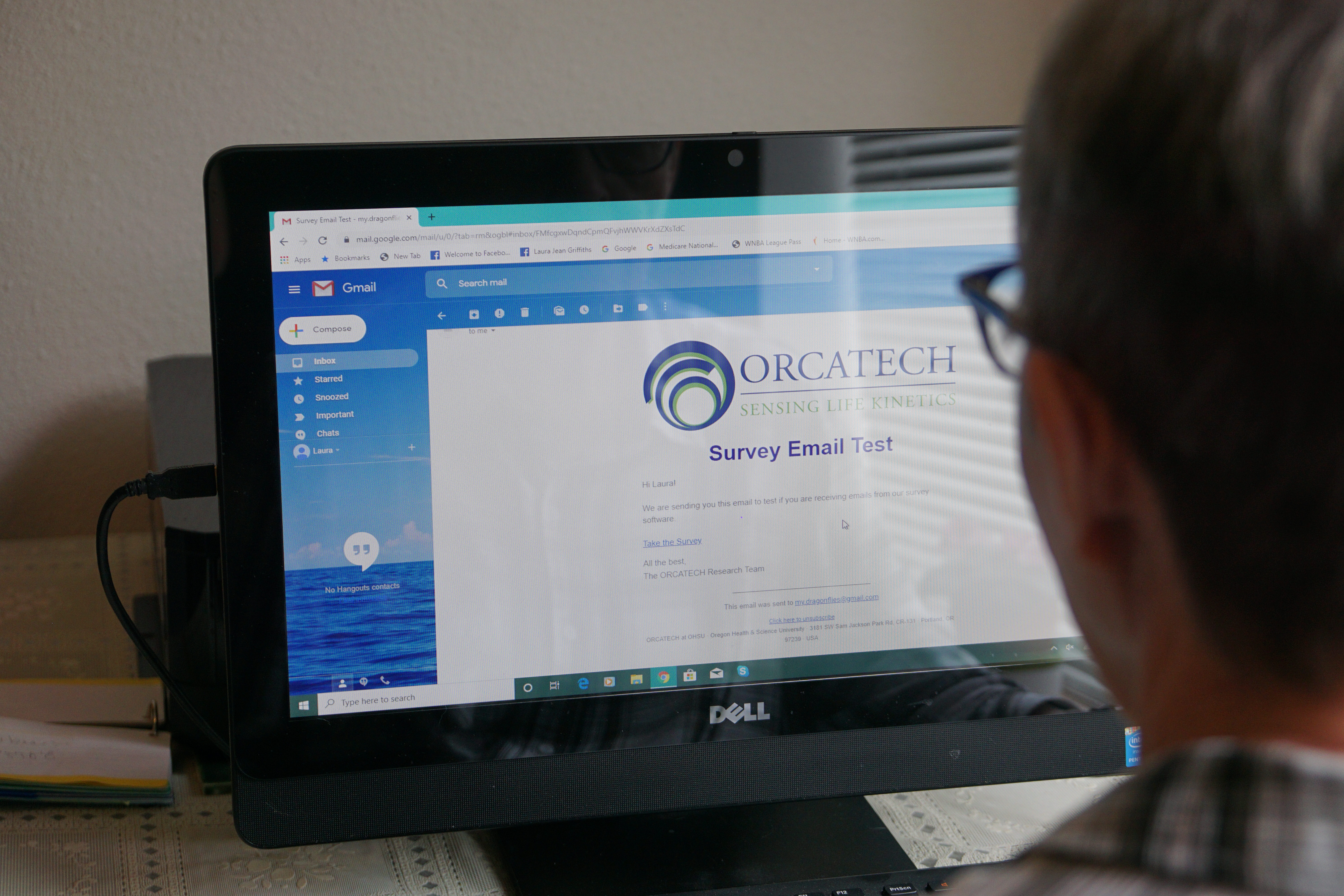 Research participant using a computer to fill out an online health survey
