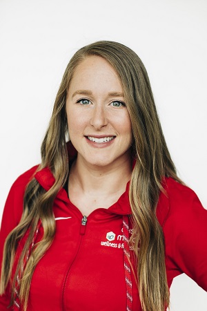Kellie McGeoy image with long hair and red jacket