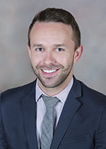 A professional photo of Dr. Ian Fields.