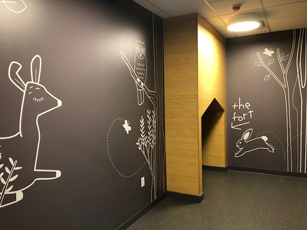 A private family waiting area for pediatric patients and their families is decorated for kids to enjoy and feel comfortable.