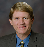 A professional photo of Dr. Jim Chesnutt from 博彩网站's Brain Institute.