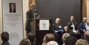 Professor Dennis Crawford MD, PhD articulating the confluence between Dr. John Hayhurst’s vision and Dr. Jaqueline Brady’s research, in celebration of her appointment as the first John and Susan Hayhurst Professorship award recipient
