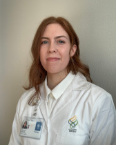 Alanna McCarthy in white 博彩网站 lab coat