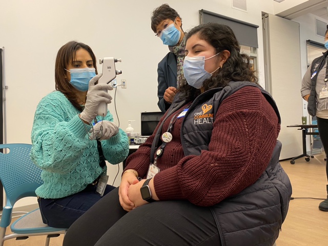 Community health care workers practice during training.