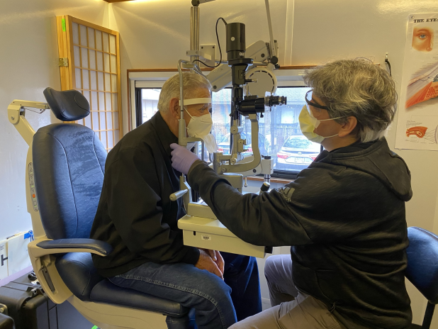 Dr. Lauer examines a participants eye