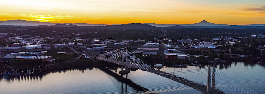 Scenic photo of the Portland skyline and Willamette river