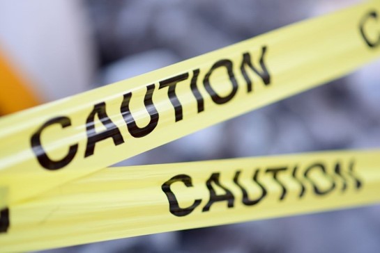 Two yellow strips marked 'Caution'.