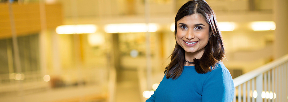 Dr. Asha Singh standing in the Robertson Life Sciences Building