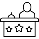 line art of desk with bell and person behind it