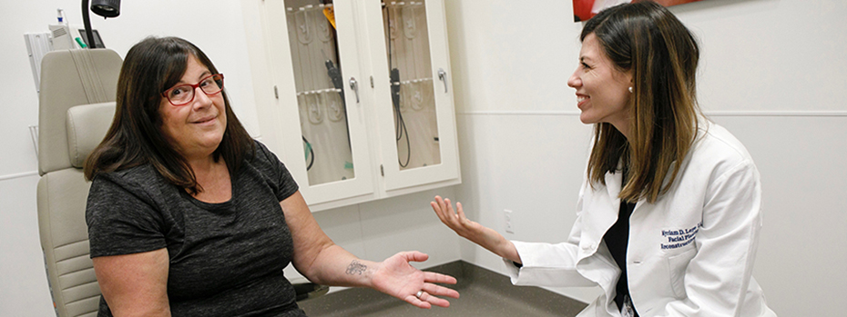 Dr. Myriam Loyo Li meets with Jarmila “Jarm” Hawes after facial reanimation surgery. Dr. Loyo Li, a facial plastic and reconstructive surgeon, oversees 博彩网站’s Facial Nerve Center, a key partner of the 博彩网站 Nerve Center.