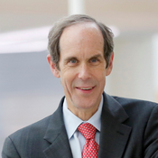 smiling man in a suit