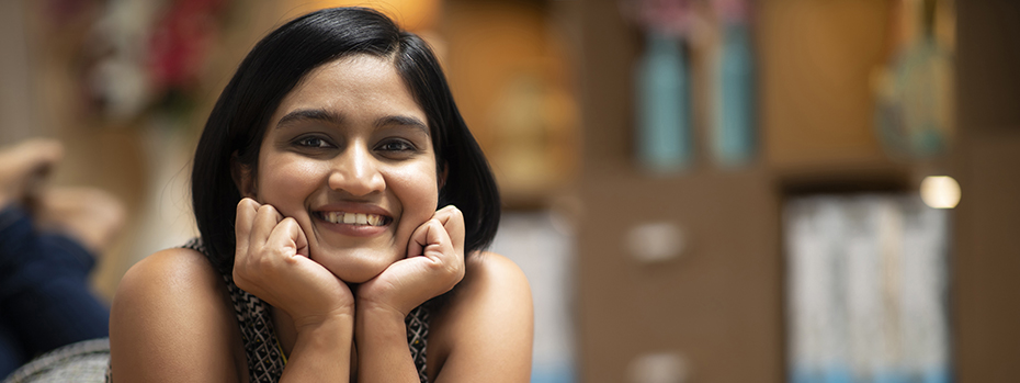 Portrait of a smiling young woman.