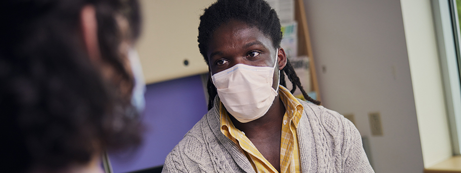 Dr. Murry meets with a teenage patient.
