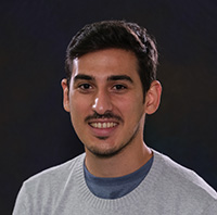 Carlos Soto Faguas smiling in a posed photo