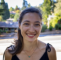 Moriah R. Arnold, outdoors and smiling