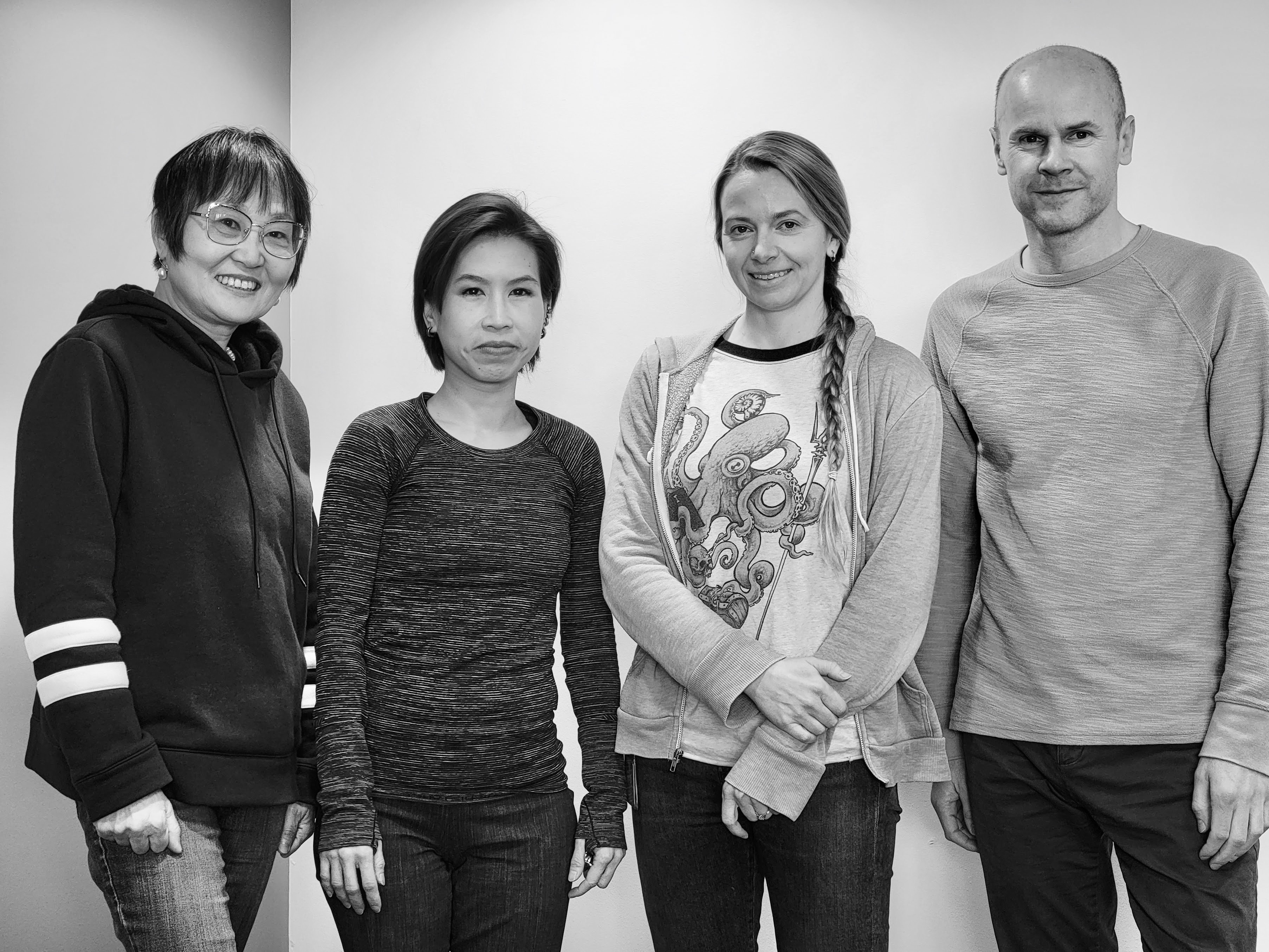 B&W picture of four people