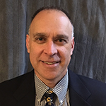 A professional photo of Dr. Joseph Pinter.