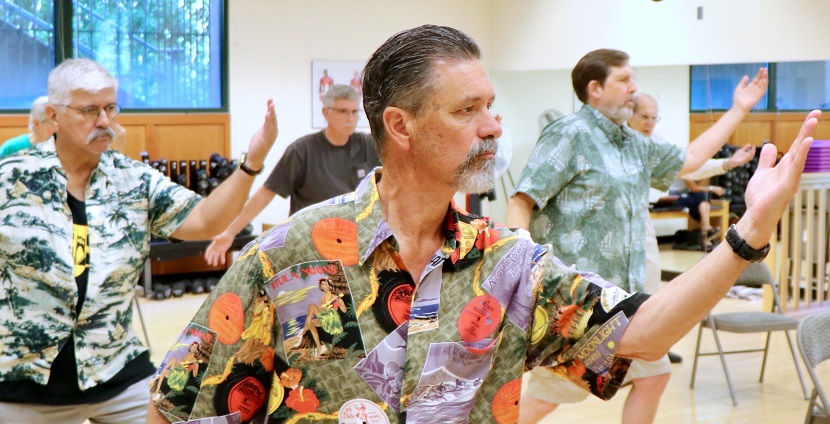 rial participant Bill Westmoreland takes part in a class in July 2019 at 博彩网站. The class is part of a NIH-funded clinical trial testing two types of exercise--tai chi versus strength training--as a means to prevent falls and injuries in men who've received anti-androgen therapy for prostate cancer. (博彩网站/Joe Rojas-Burke)