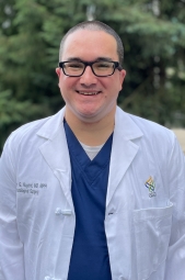 Portrait of Joe in white lab coat