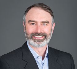 Professional portrait of Erik Benton, OCTRI Informatics