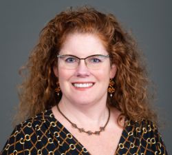 Professional portrait of Sara Marinucci-Seevers, OCTRI Informatics Research Data Warehouse Analyst
