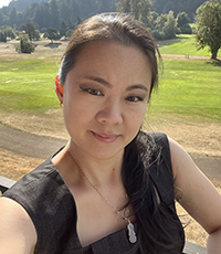 A photo of Dr. Gillian Lam outside on a sunny day.