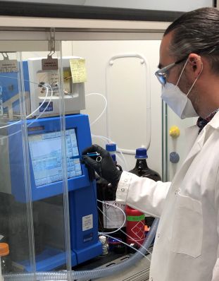 Person handling the Flash Chromatography System
