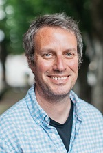 Kevin Brown smiling in headshot